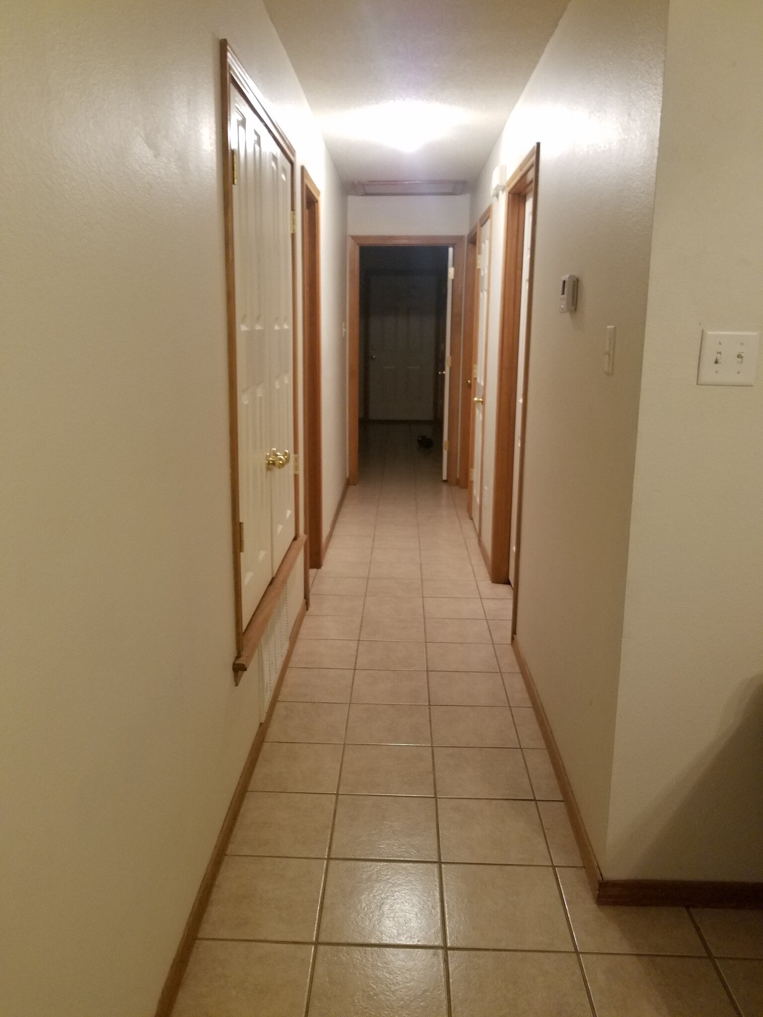 Master at the end, two bedrooms on the left, bathroom on the right - 5119 Galloping Way