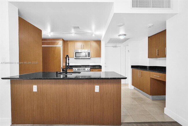 Building Photo - 10275 Collins Ave