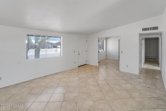 Building Photo - 7791 N John Paul Jones Ave