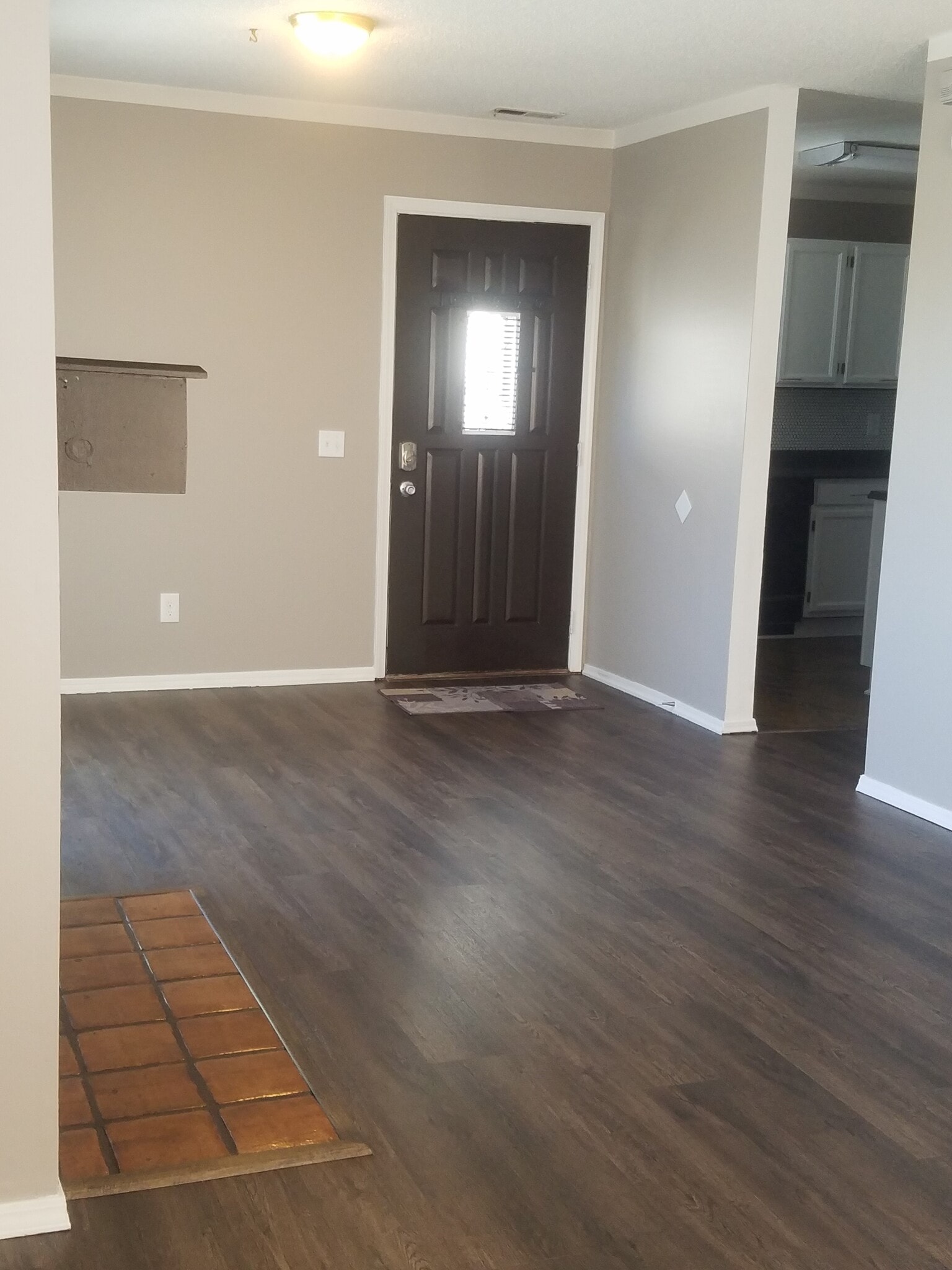 Sunny living room with fireplace. - 945 Tampico Court