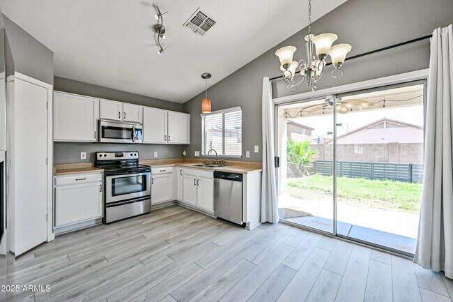Building Photo - 12021 W Columbine Dr