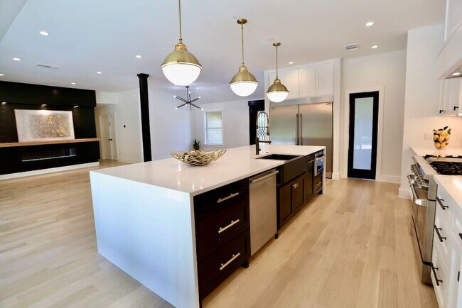 Building Photo - Executive Lease Near Preston Hollow  - Chef's Kitchen, Gated Drive & Spacious Patio