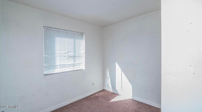 Building Photo - 6302 N 64th Dr