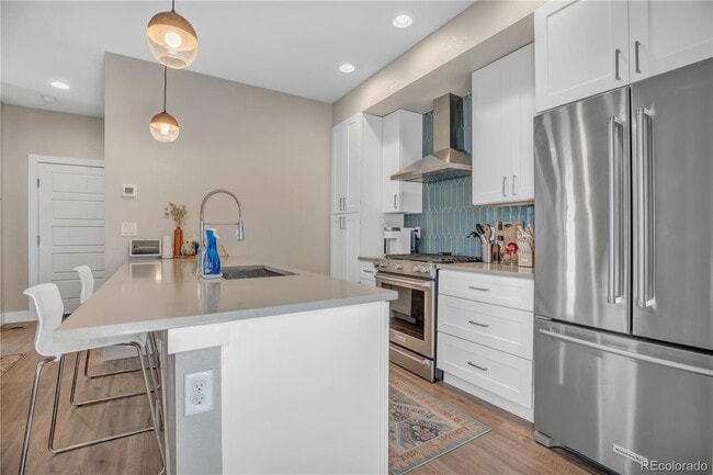 Building Photo - Spacious 3-Bed Townhouse with Finished Basement in Denver's Heart