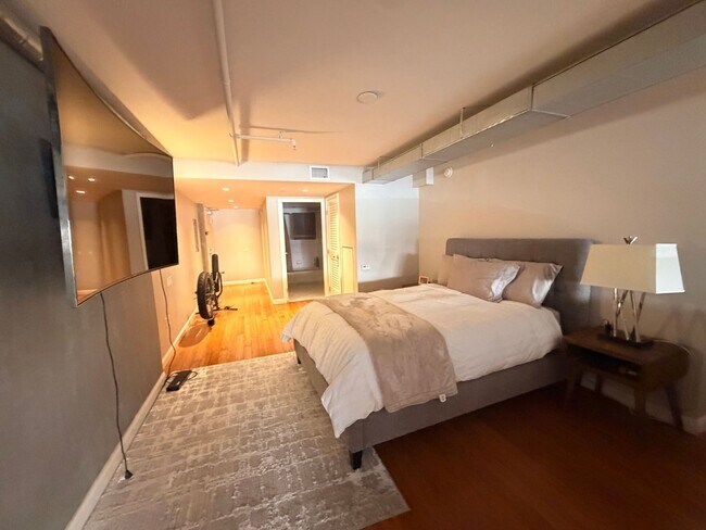 Building Photo - Industrial-Chic Loft in East Village | 1,049 Sq Ft | Gym & Rooftop