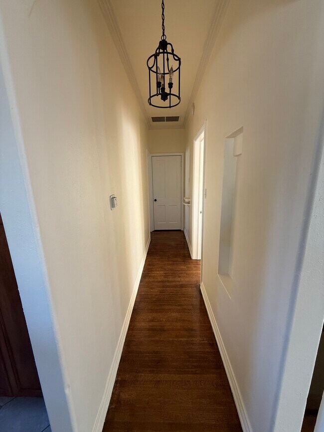 hall closet - 5906 San Vicente Blvd