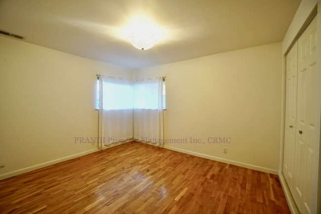 Building Photo - Novato Home with Big Yard, Backs to Pioneer Park!