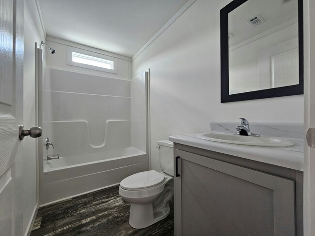 Building Photo - 6691 Hidden Oaks Dr