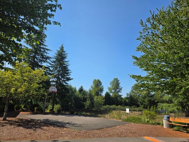 Building Photo - 4-Bedroom Corner-Lot Home | Central A/C | Carpet-Free Living | Walk to Schools, Parks and Cedar R...