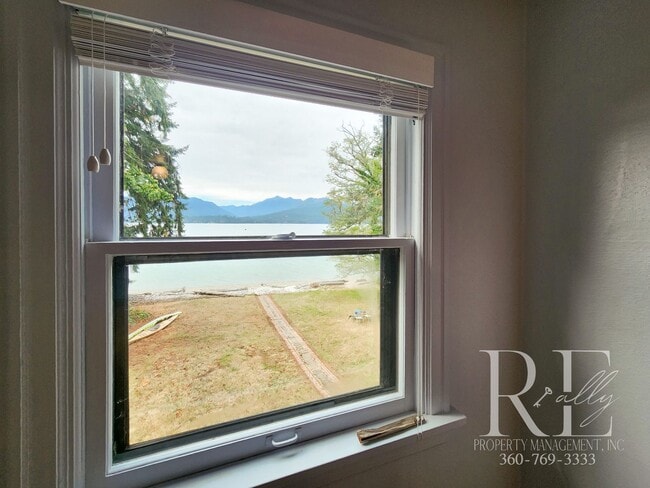 Building Photo - Waterfront Tudor | Private, Vintage Charm with Casita