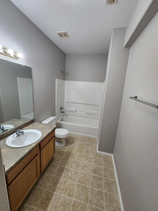 Building Photo - 3 Bedroom 3 Bath Rancher Town Home 2 Car Garage