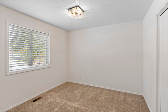 Building Photo - 8290 N Uplands Dr