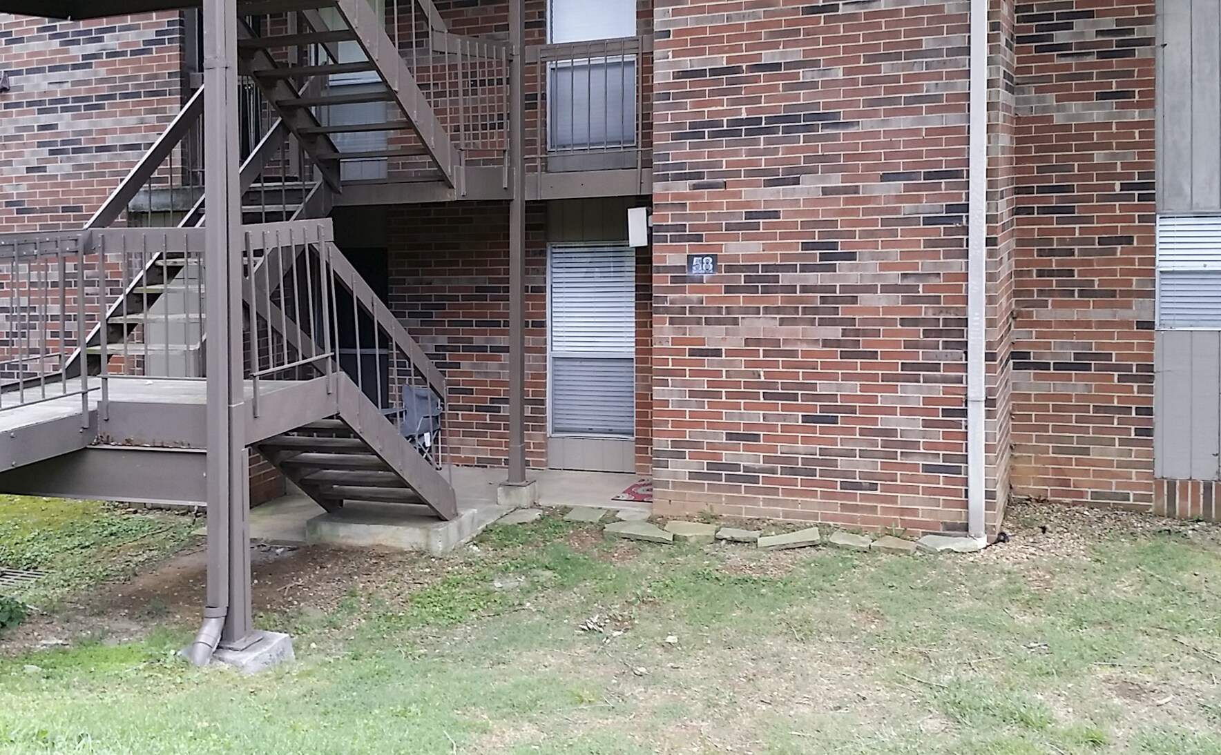 flight of stairs from parking space to front door - 8530 Brasilia Ct