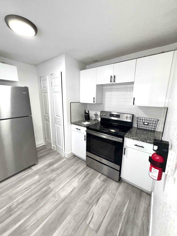 Building Photo - 1211 E 18th Ave