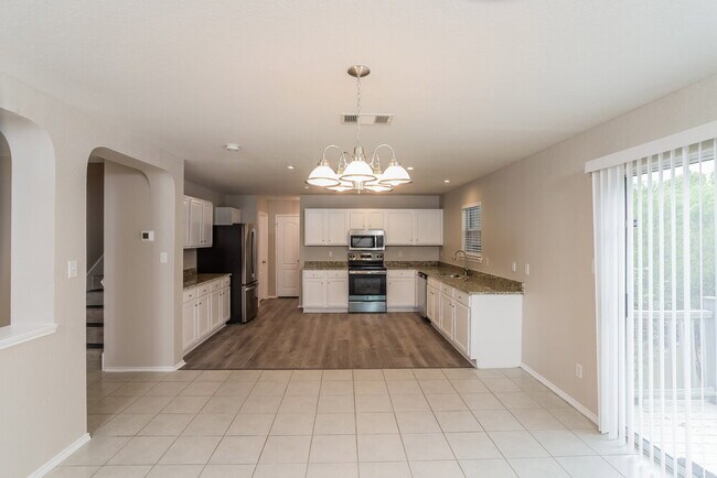 Building Photo - 10711 Amble Coach