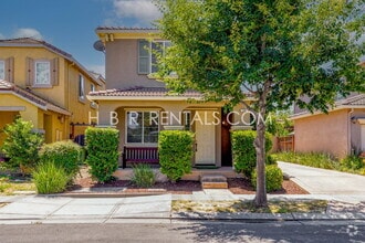 Building Photo - Questa Village: Spacious 3-Bedroom Retreat...