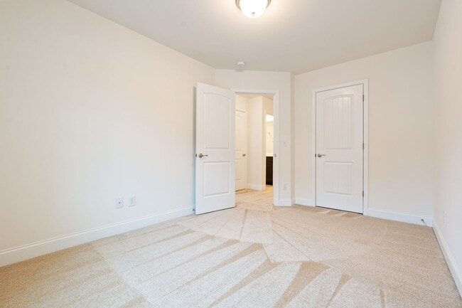 Building Photo - Stylish and Spacious 3 Bedroom, 2.5 Bathroom End-Unit Townhome w/ Garage! - ** SPECIAL OFFER: HAL...