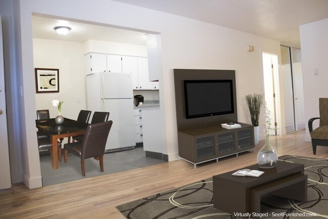 Building Photo - Bottom level 2bed, new s/s appliances, off street parking, on site laundry, all dogs welcome!