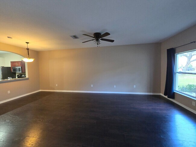 Building Photo - Great Town Home in Gated Community with Pool and Pond View