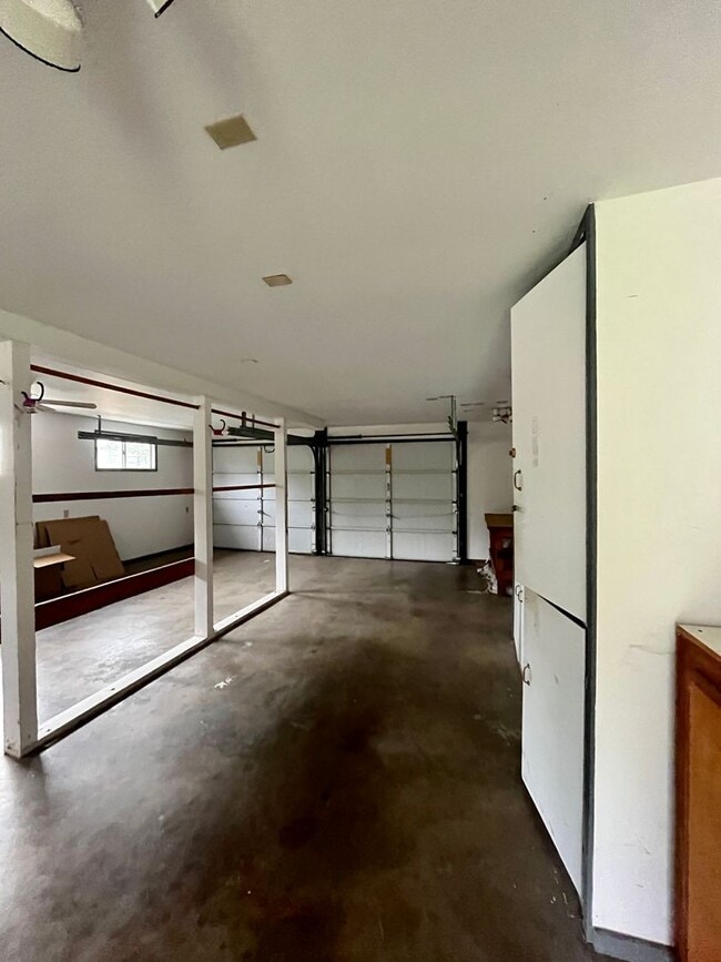 Building Photo - Cozy Single family home with two car garage and controlled access gate