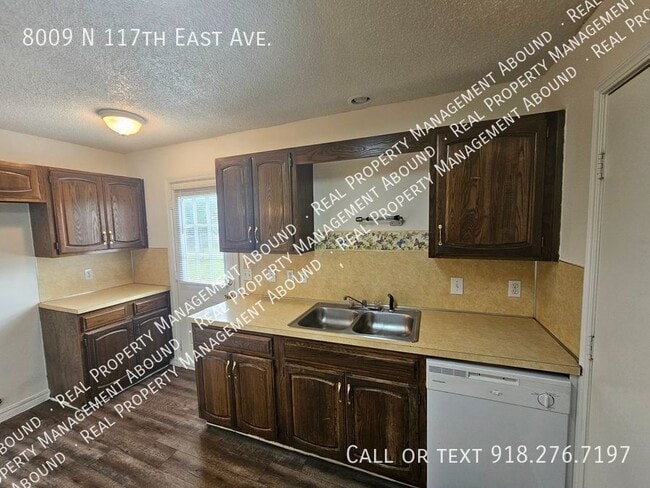 Building Photo - 8009 N 117th E Ave