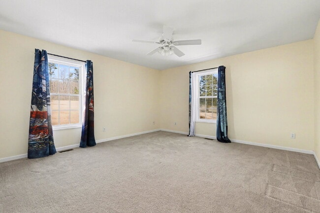 Building Photo - Private 1-Acre Retreat with Fenced Yard, Back Deck & Fireplace – No HOA