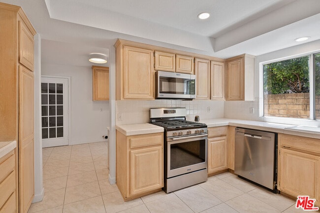 Building Photo - 8473 Penfield Ave