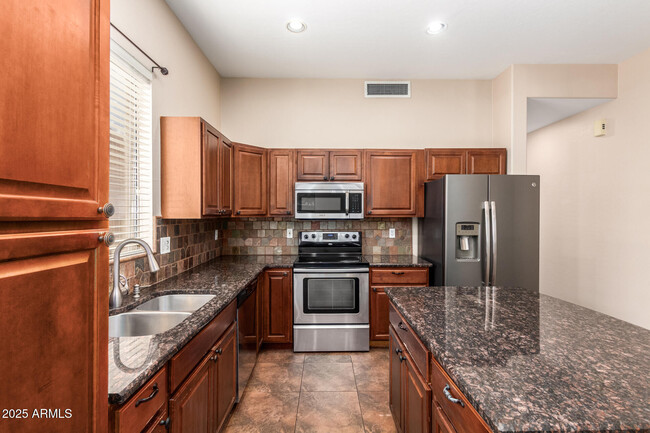 Building Photo - 6923 W Lone Cactus Dr