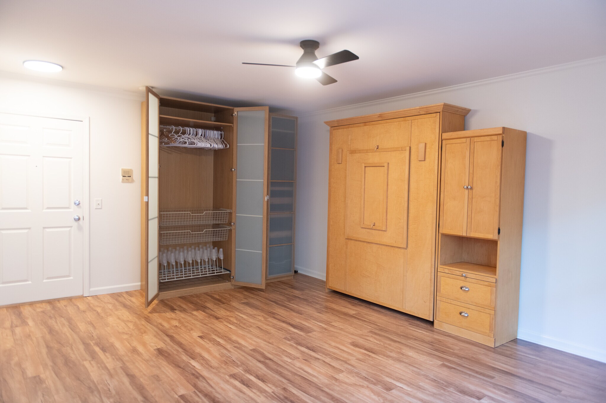 Storage cabinet open - 701 NE 28th Ave