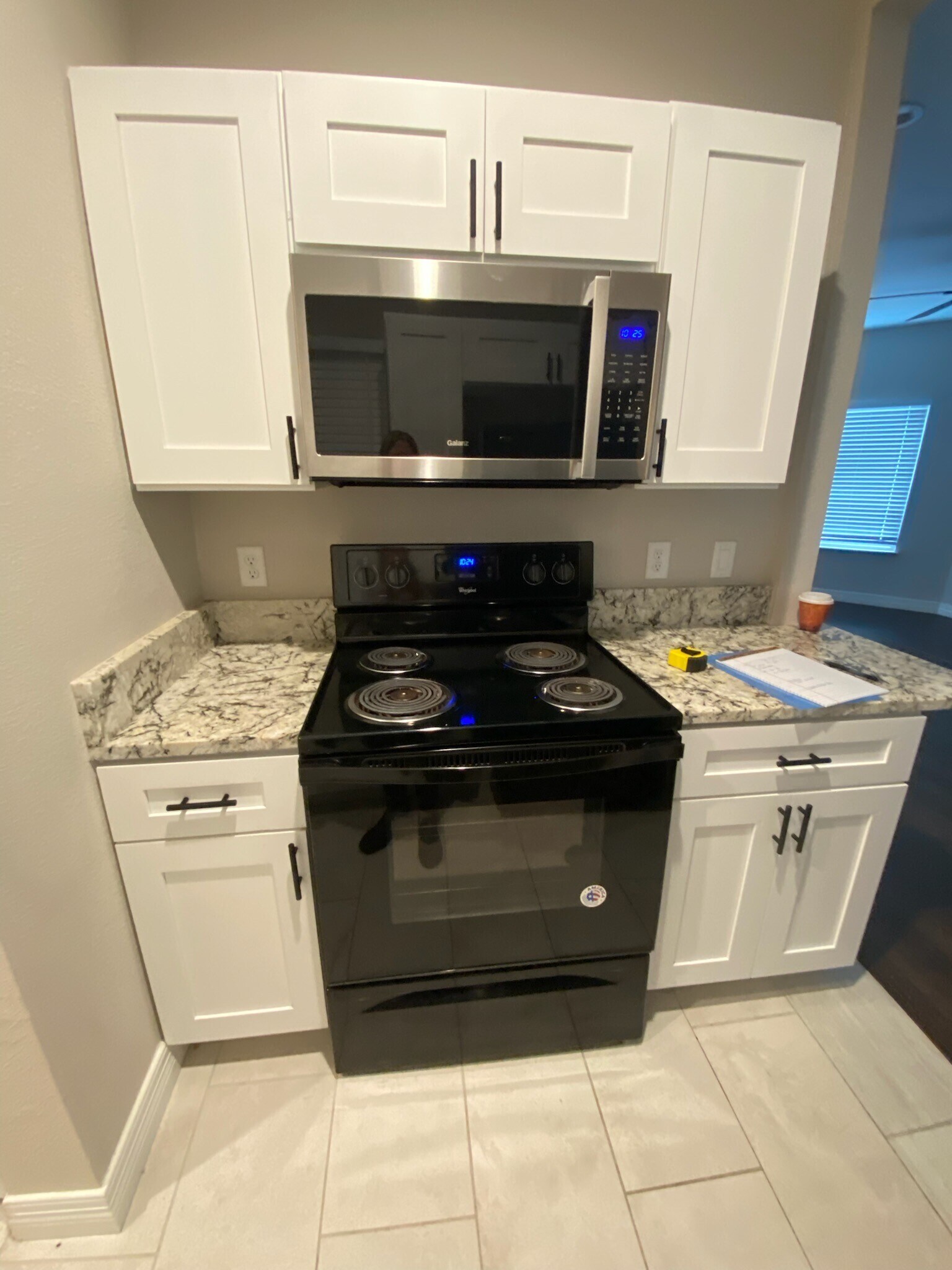 Stove and Microwave in kitchen - 5550 Spring Valley Rd