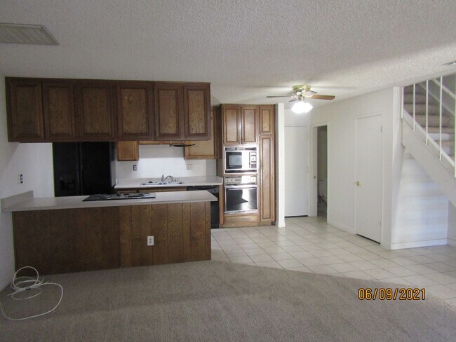 Building Photo - Centrally Located Large Two Story Condo wi...