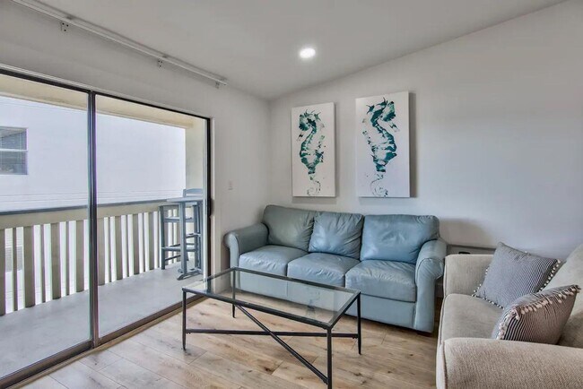 Building Photo - 50% off first months rent.  Gulf front com...