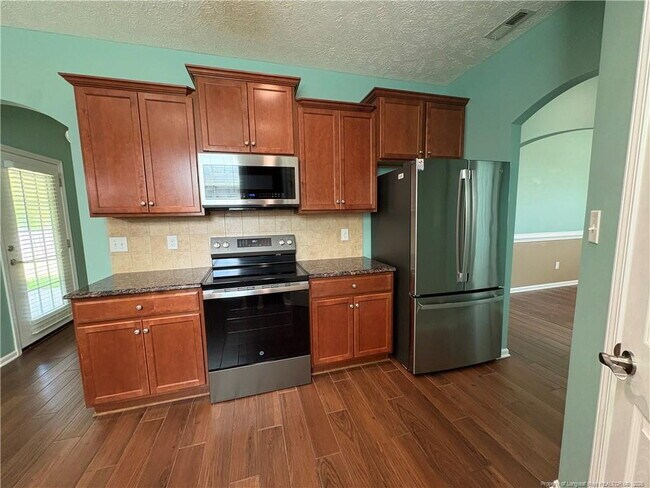 Building Photo - Experience Elegance: 4-Bedroom Gem with Granite Charm on Beaubien Drive