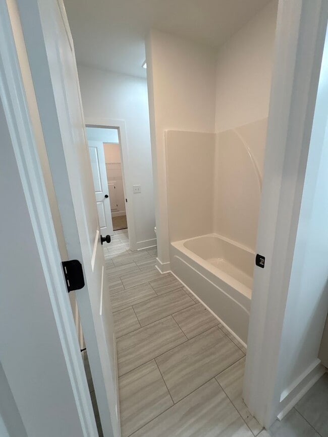 Building Photo - Beautiful New Construction Townhome in She...