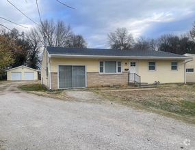 Building Photo - Spacious 4-Bedroom Home with Large Backyar...