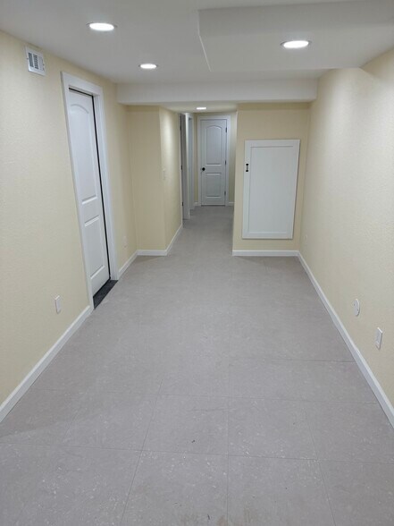 Basement living area - 2675 S University Blvd