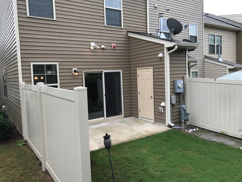 Back patio area including extra outside storage - NOW FENCED IN! - 6417 Swatner Drive