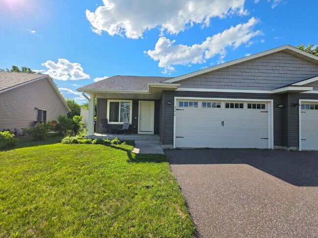 Building Photo - FREE SEPTEMBER RENT for this Spacious 4-Bedroom Home with Vaulted Ceilings with Finished Basement...
