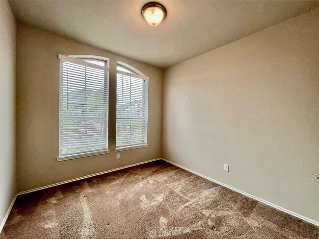 Building Photo - 8711 Windsong Trail Dr
