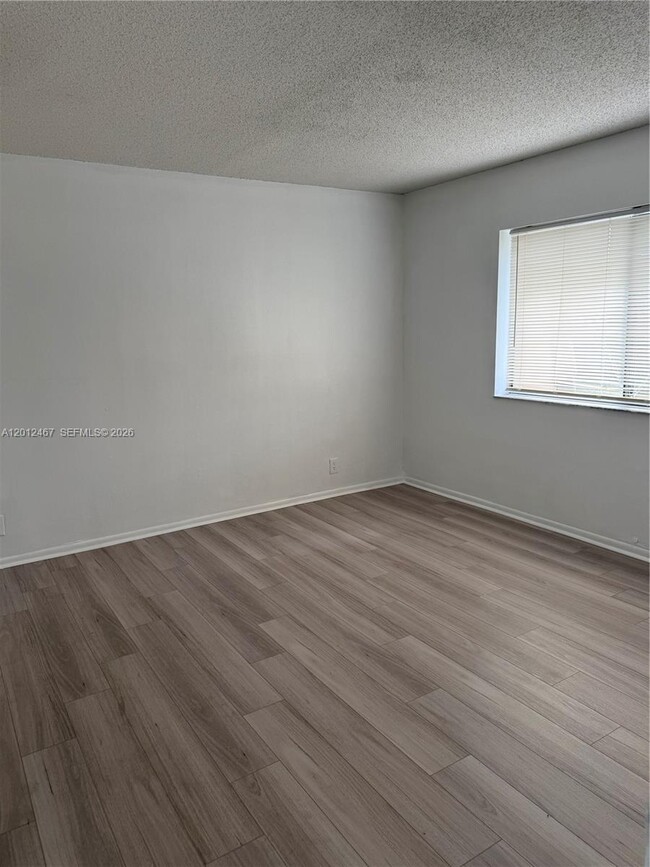 Building Photo - 10916 Royal Palm Blvd