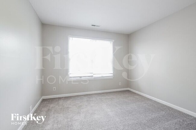 Building Photo - 10705 Creekside Woods Dr