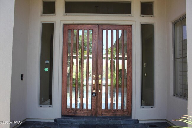 Building Photo - 7484 E Pontebella Dr