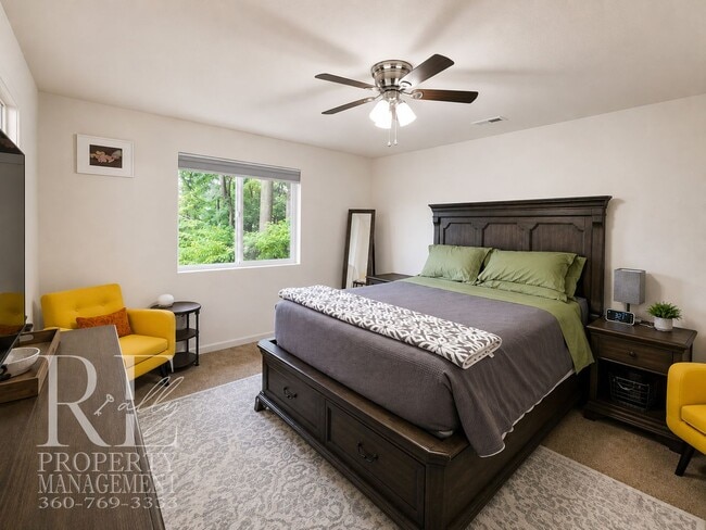 Building Photo - Spacious 3-Story Home with Flexible Living Space, Heat Pump & Private Deck Retreat