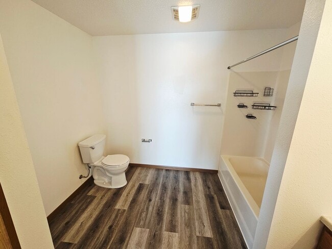 Building Photo - Fully Remodeled 1,250 Sq Ft 2 Bedroom Apartment with Garage, In-Unit Laundry & Private Balcony – ...