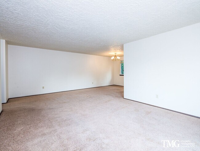 Building Photo - Charming 2BR Condo with a Garage in the Highly Desired McGillivray Neighborhood!