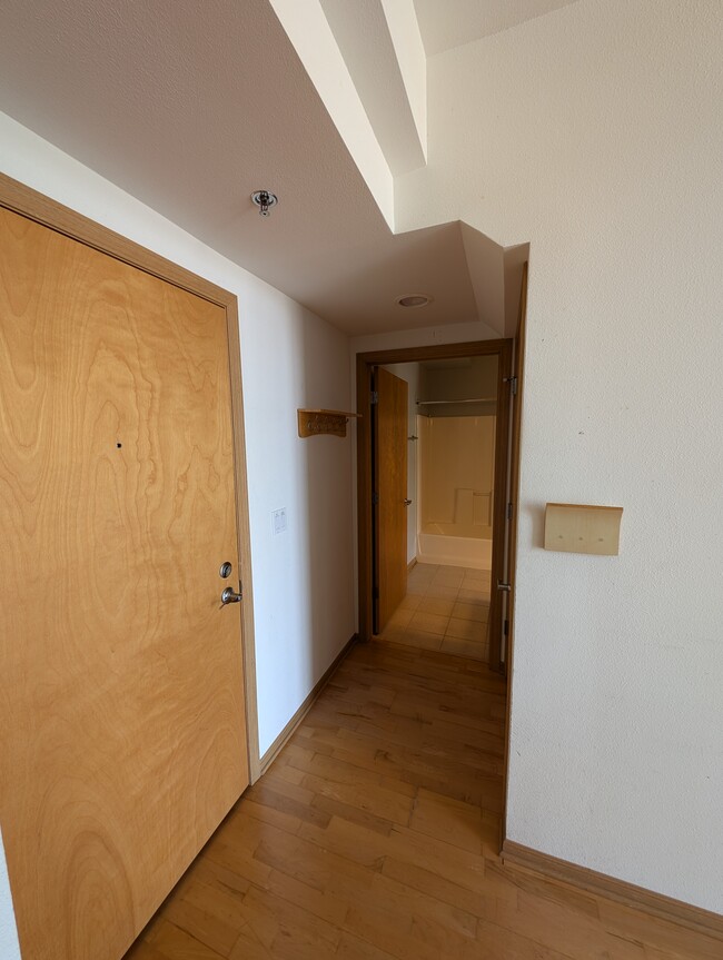 Front hall to the main floor bathroom - 2121 S Kinnickinnic Ave