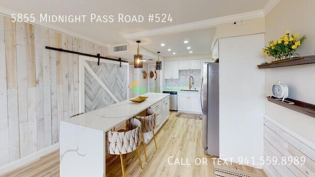 Building Photo - 5855 Midnight Pass Rd