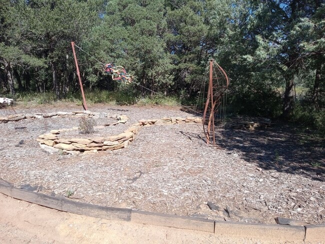Building Photo - COZY HOME IN THE BEAUTIFUL TOWN OF TIJERAS | Showings available NOW!!