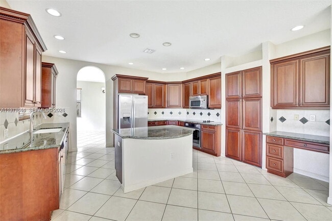 Building Photo - Southwest 51st Street, Miramar, FL 33027 - 5 BR 3.5 BA single-family home