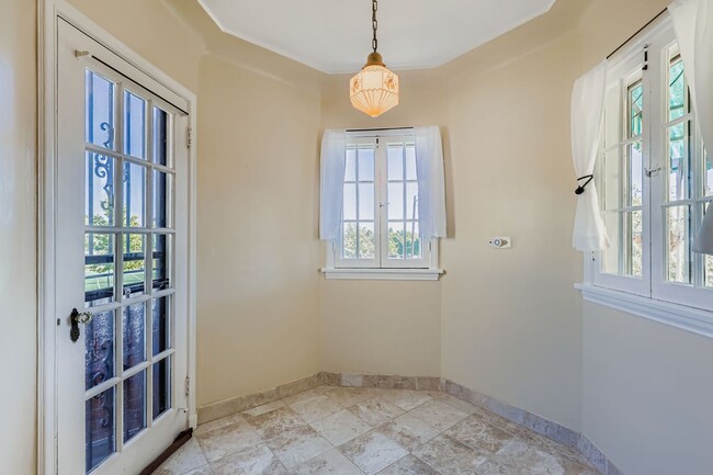 Building Photo - LOCATION LOCATION!! Unique Tudor 2-bed 1-bath upstairs unit in beautiful Tudor Duplex- All Utilit...